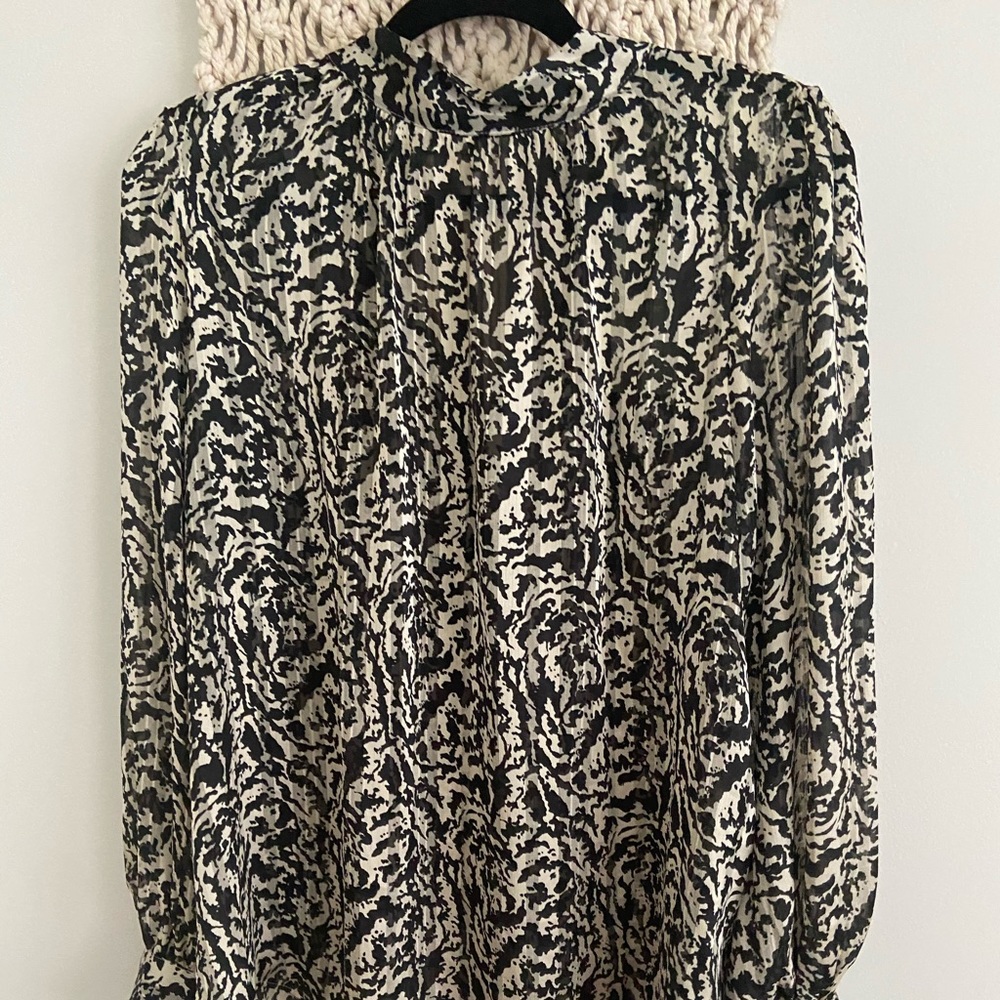 Black and white patterned blouse